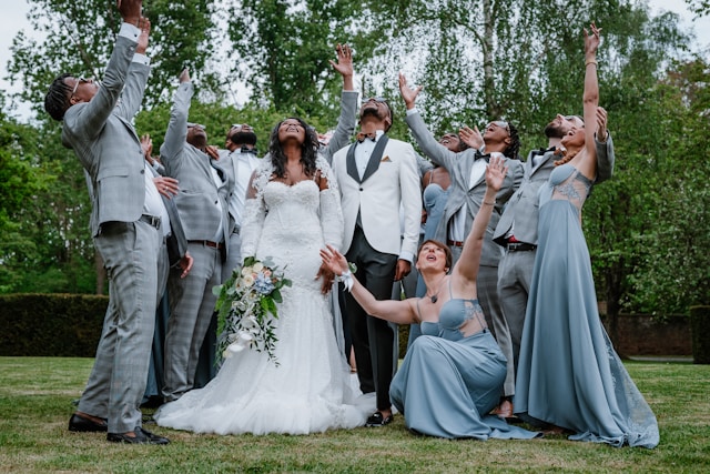 wedding party posing for photo Wedding party posing for photo